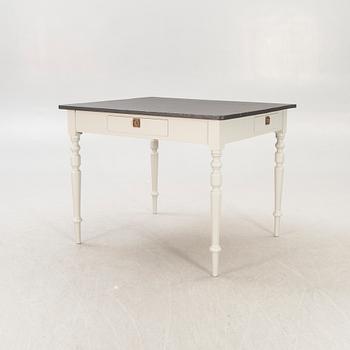 A painted working table later part of the 19th century.