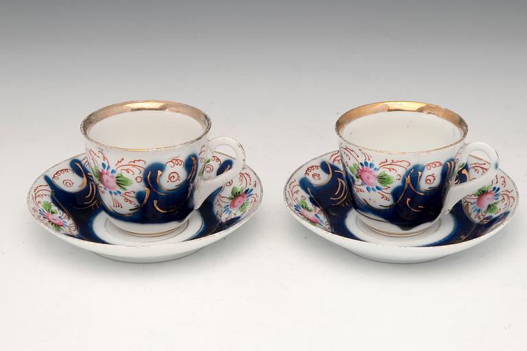 A SET OF TWO CUPS.