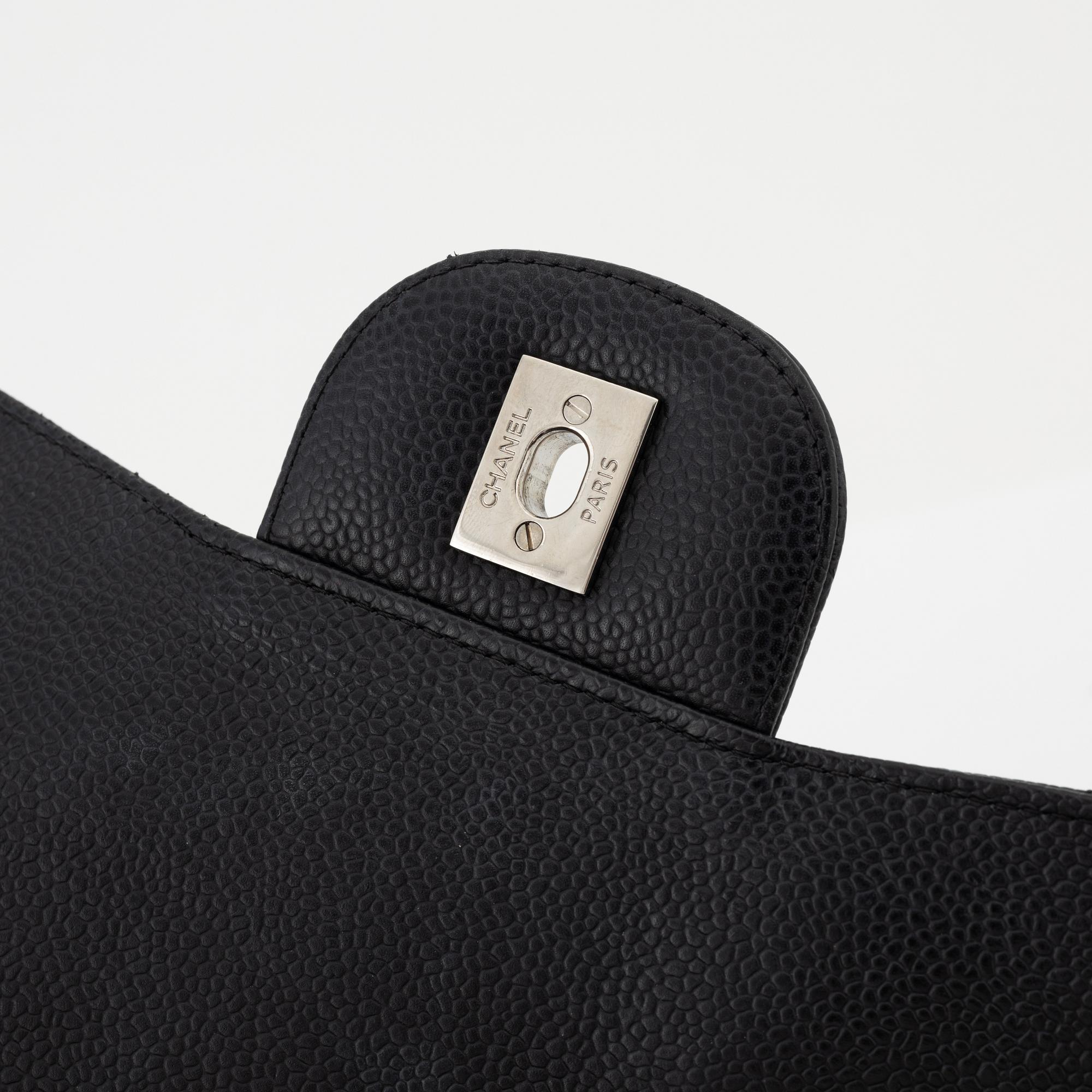 Chanel, a black caviar leather 'Double Flap Bag', 2013-14.