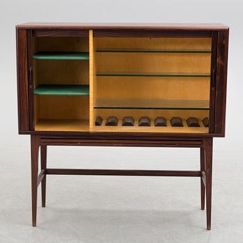 KURT ØSTERVIG, a Danish rosewood veneered drinks cabinet, 1960's.