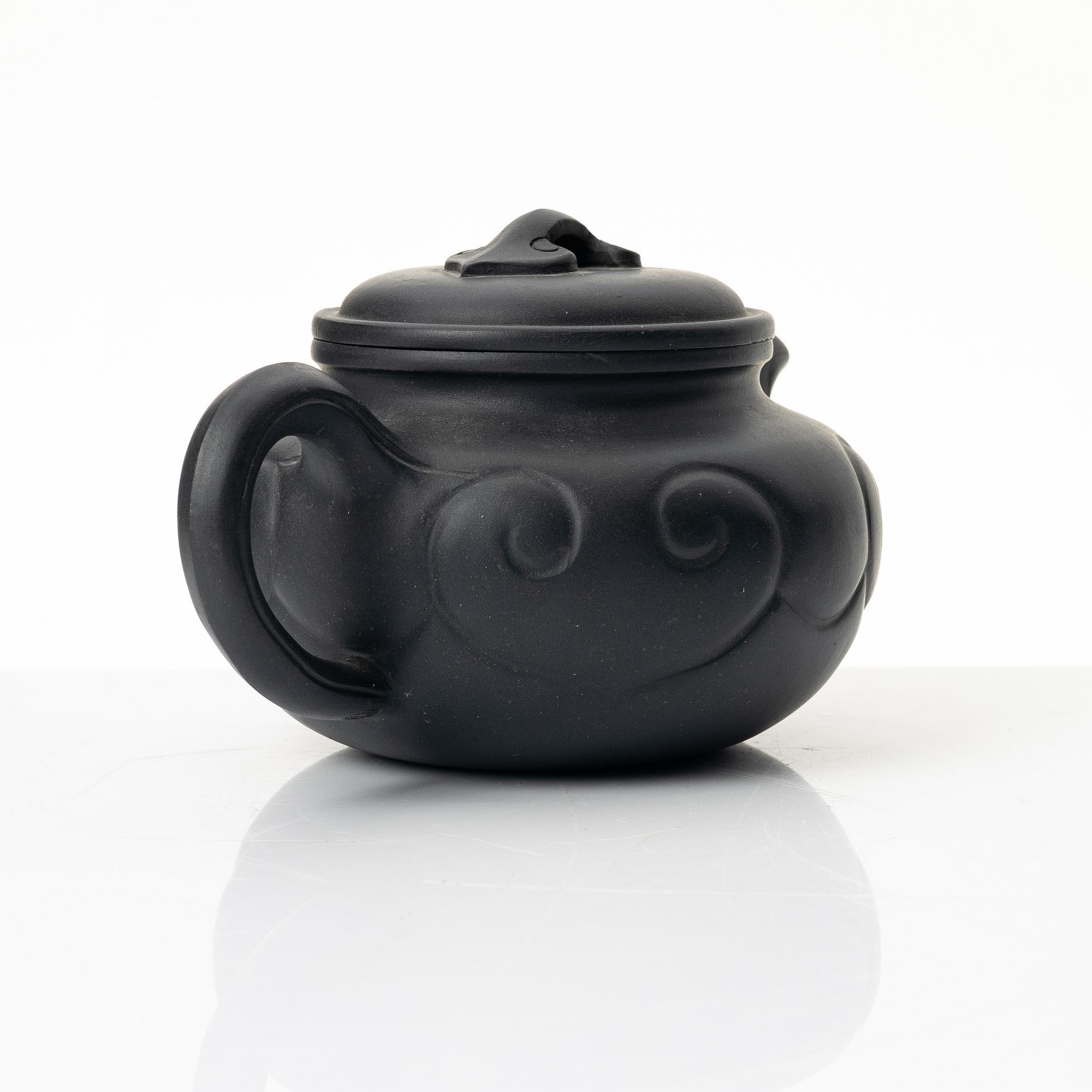 Zhou Guizhen, A 'ruyi' blue yixing teapot, 1980s.