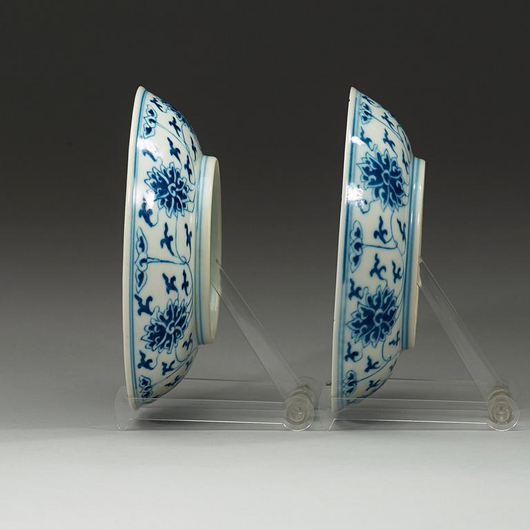 A pair of blue and white lotus dishes, Qing dynasty, Guangxu (1874-1908) marks and of period.