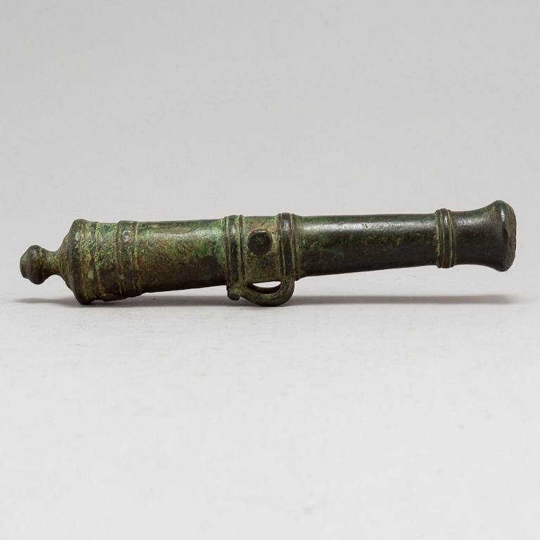 A small bronze cannon probably 19th Century.