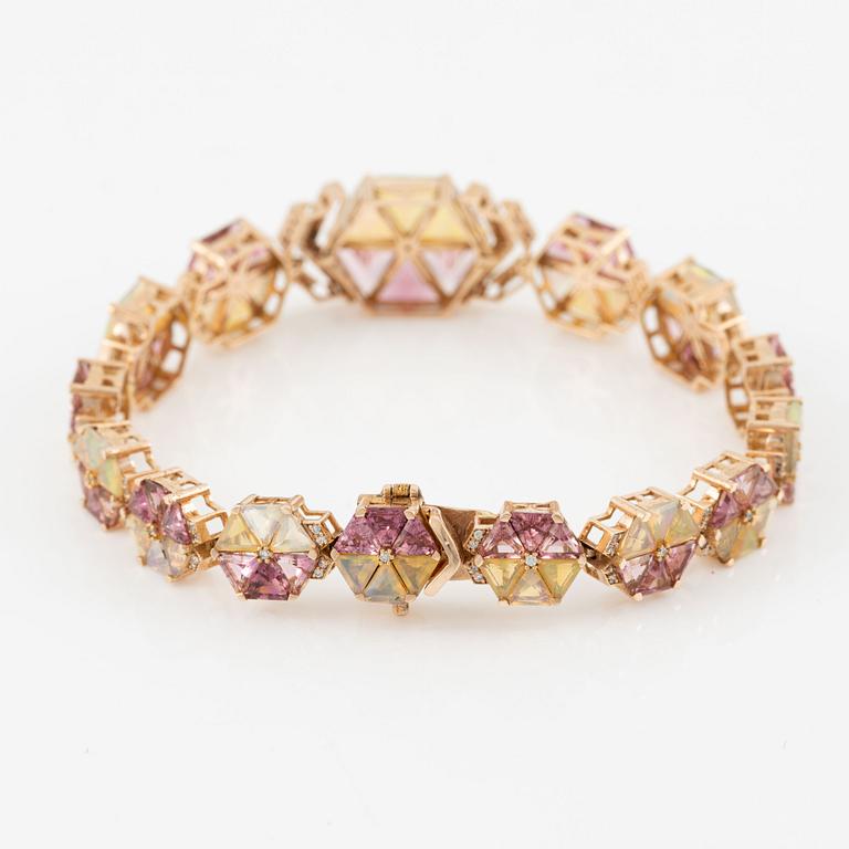 Bracelet with pink tourmalines, opals, and brilliant-cut diamonds.