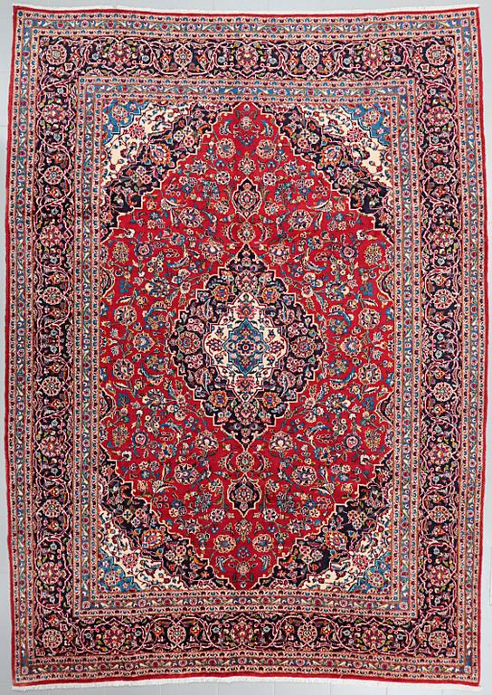 A Keshan rug, 358 x 258 cm.