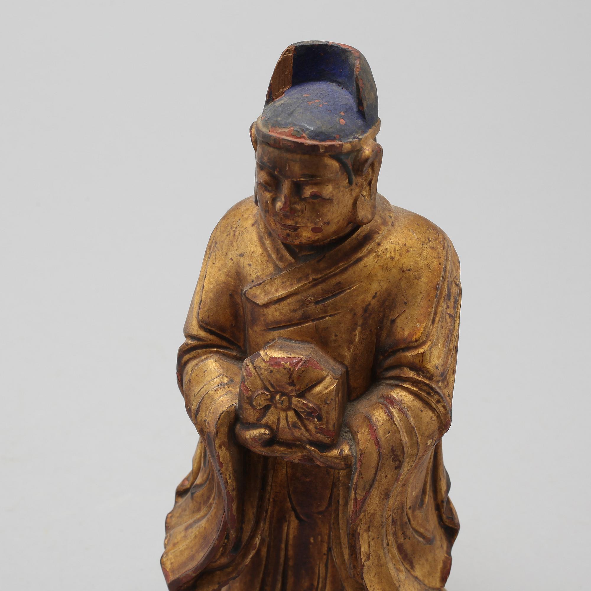 Two Chinese sculptures of deities, 20th Century.
