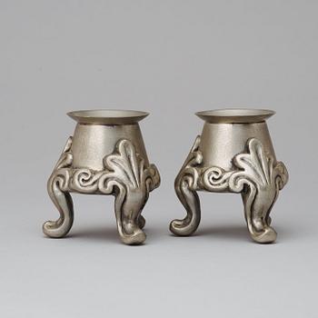 A pair of Svenskt Tenn pewter candlesticks, Stockholm 1928.