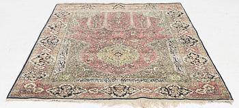 A semi-antique silk Quum, c. 216 x 141 cm.