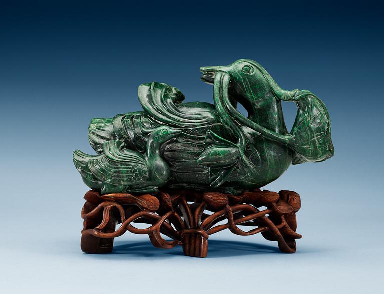 A green stone sculpture of two ducks, presumably late Qing dynasty.