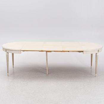 A Gustavian style dining table with ten chairs, Sweden, mid/second half of the 20th century.