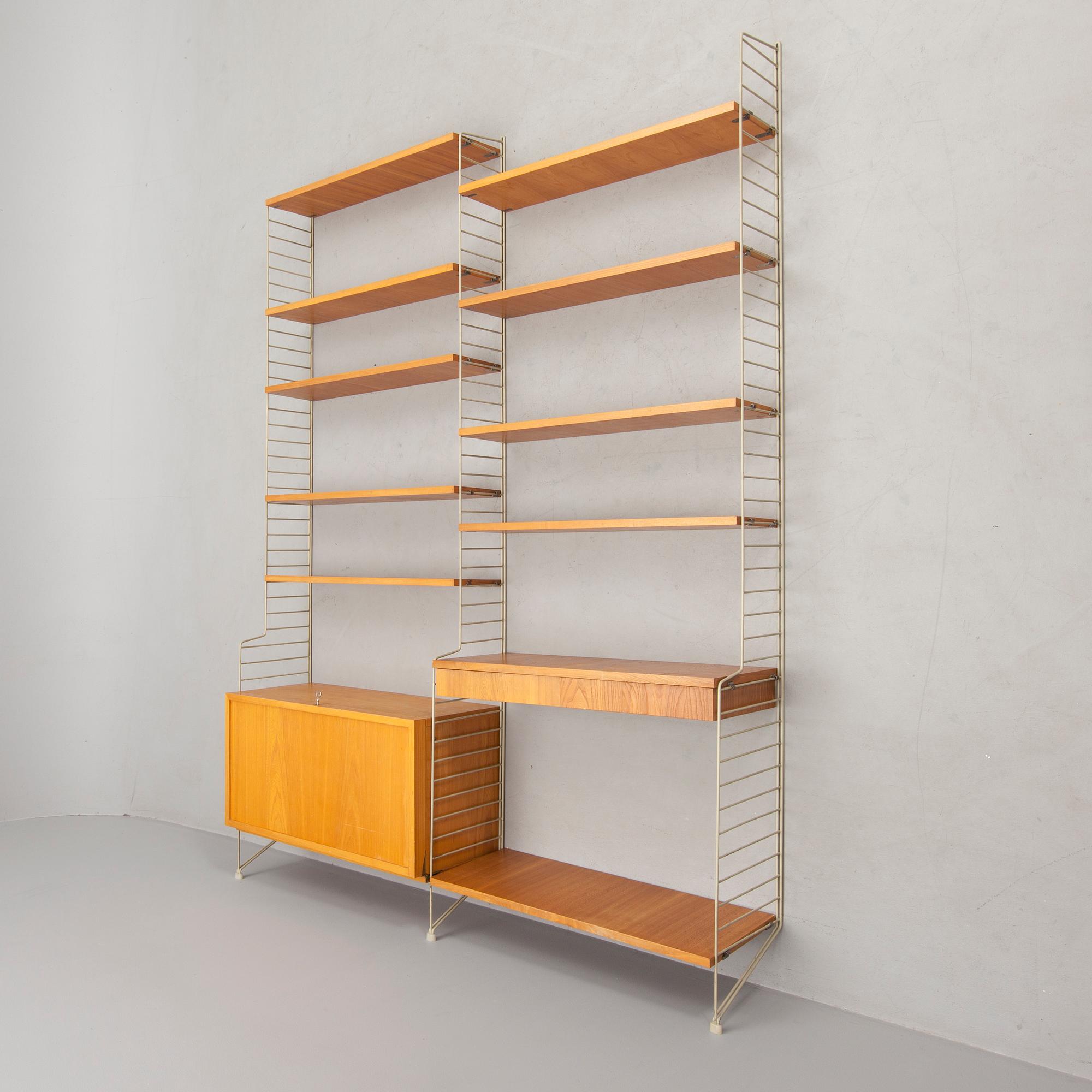 A mid 20th century String shelf system, designed by Nisse Strinning for String Design AB.