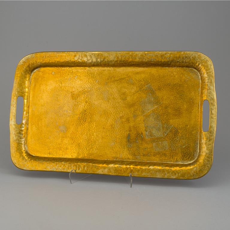 An early 1900s brass tray.