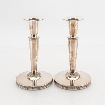 A Swedish 20th century pair of silver candle sticks mark of K&E Carlson Gohtenburg 1965.