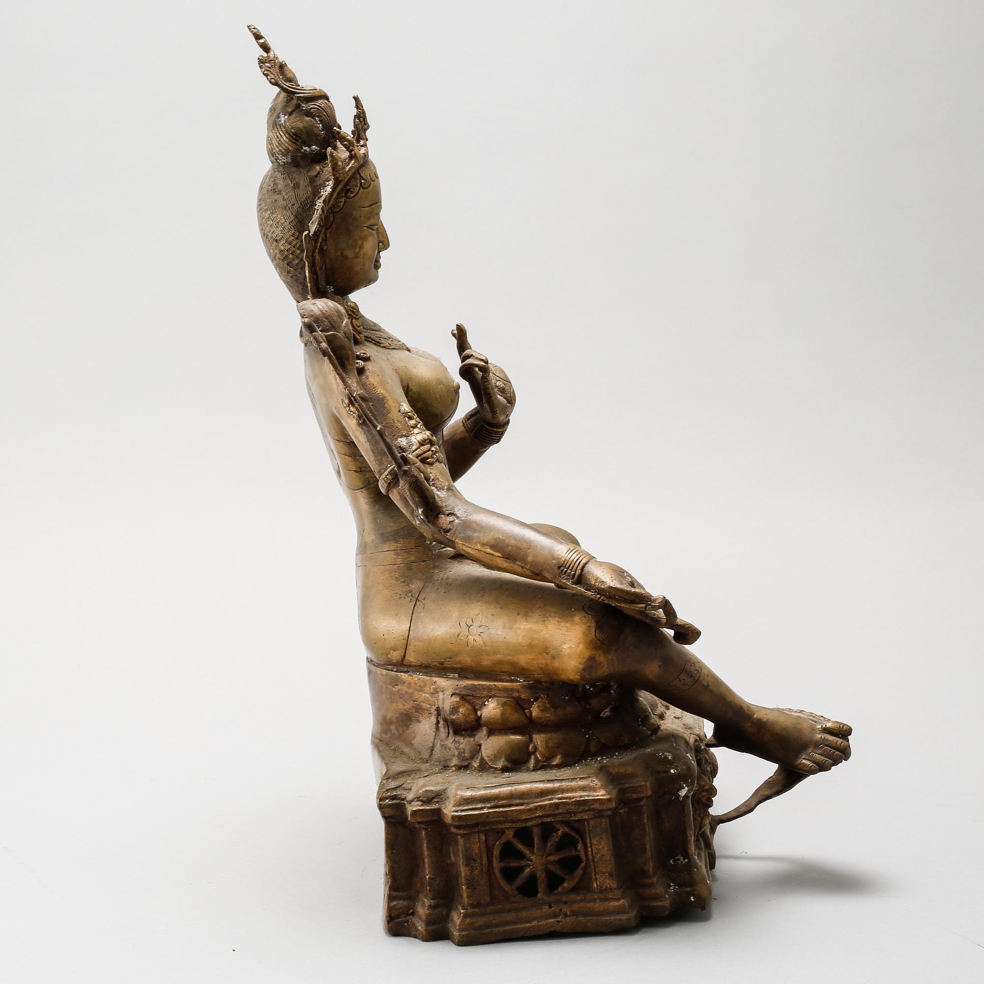 A modern made Nepalese sculpture.