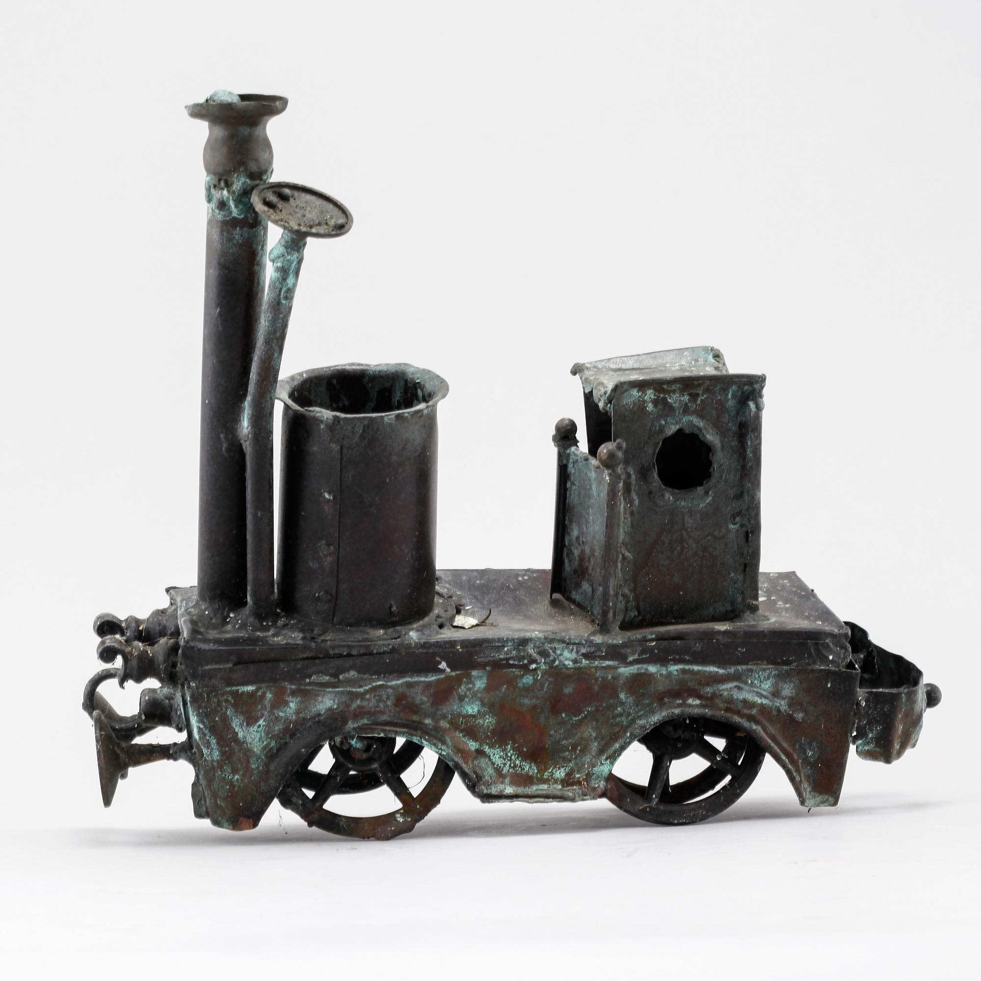 a metal sculpture, not signed.