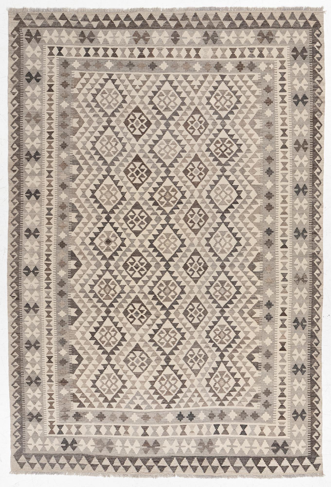 A Kelim carpet, a. 295 x 200 cm.