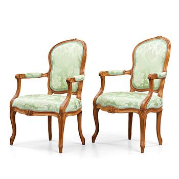 46. Two matched Louis XV 18th century armchairs.