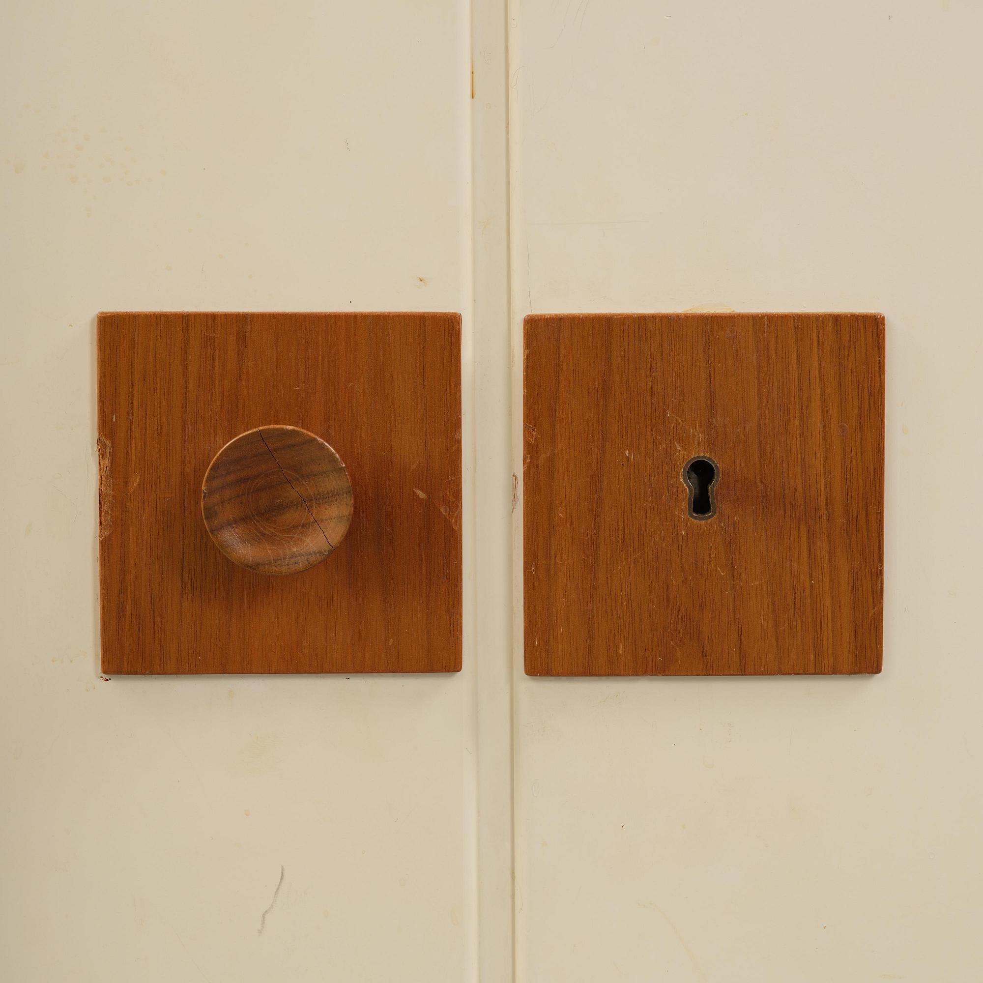 Josef Frank, a set of three bookcases model "B 2255", Firma Svenskt Tenn, mid-20th century, provenance Estrid Ericson.