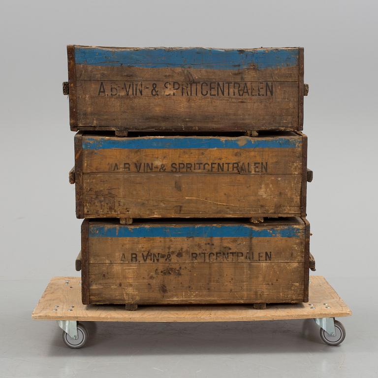 Three mid 1900s wooden boxes.