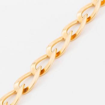 An 18K gold Jan Hellströmer bracelet.