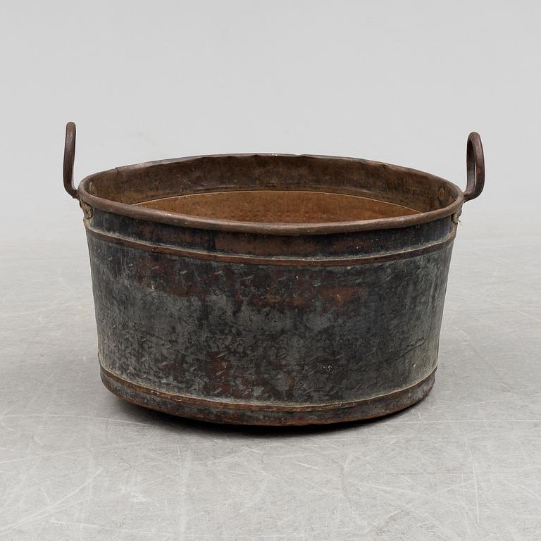 A 19th century copper cauldron.