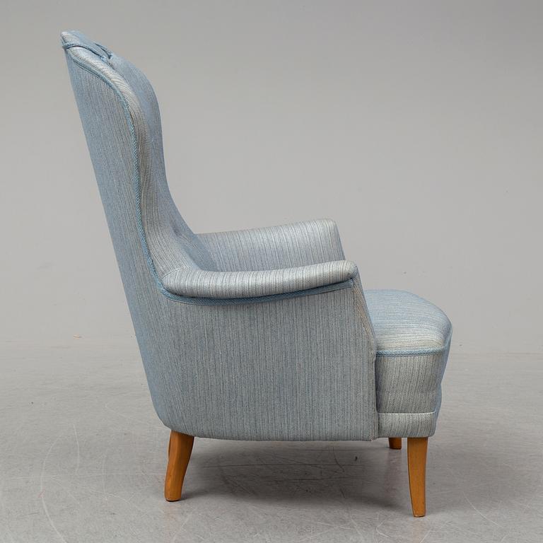A second half of the 20th Century armchair by Carl Malmsten.
