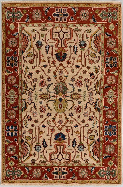 A RUG, Ushak design, ca 184 x 123 cm.
