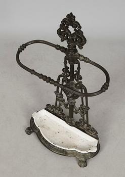 PARAPLYSTÄLL, gjutjärn, 1900-talets första hälft.