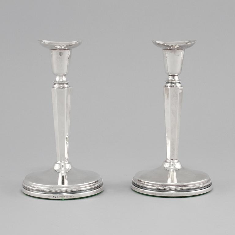 LJUSSTAKAR, ett par, silver, Eric Löfman, MEMA, Linköping, 1998.