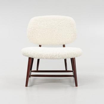 Alf Svensson, a 'TeVe', easy chair with new sheepskin upholstery, Bra Bohag, Studio Ljungs Industrier, 1950s.