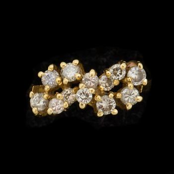 RING, 18 k guld med briljantslipade diamanter ca 0,36 ct. Vikt ca 2,5 g.