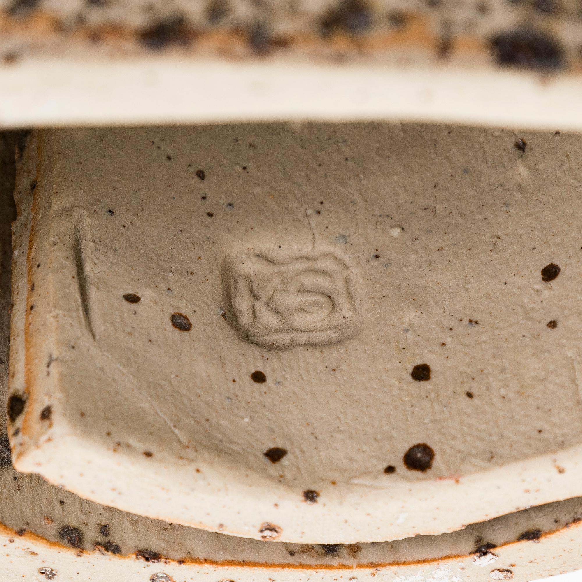 Kyllikki Salmenhaara, a 'winding' stoneware sculpture signed KS.