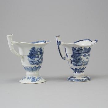 Two Chinese blue and white export porcelain jugs, Qing dynasty, Qianlong (1736-95).