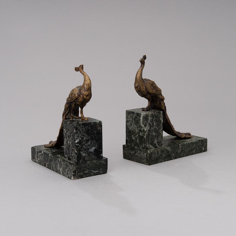 BOKSTÖD, 2 st, mässing och sten, 1900-talets första hälft.