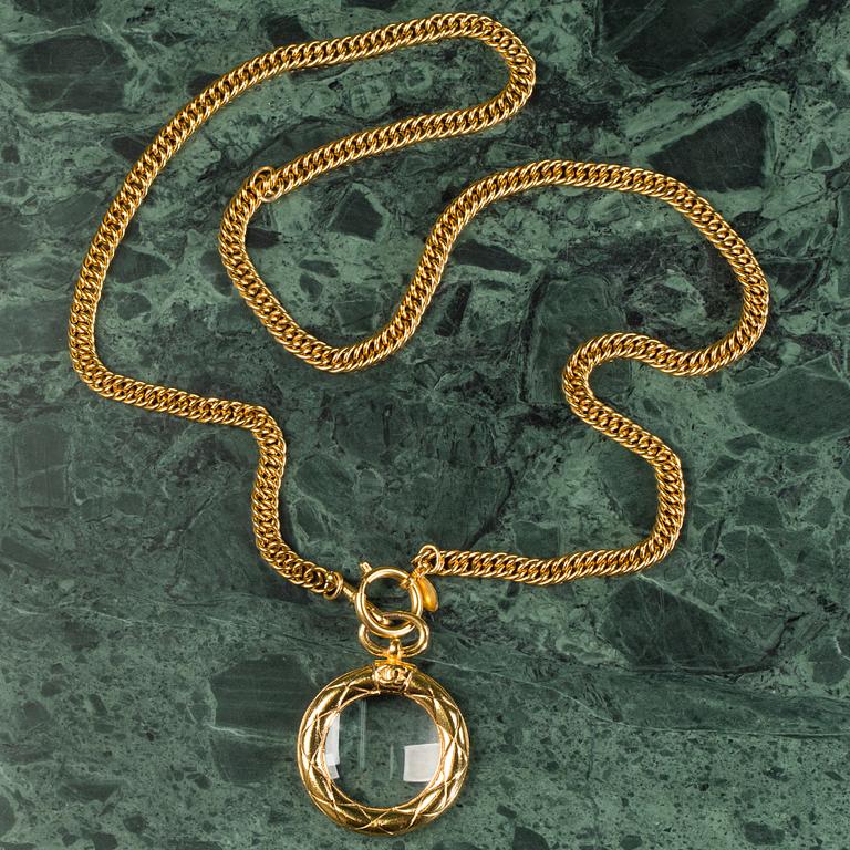 A necklace by CHANEL.