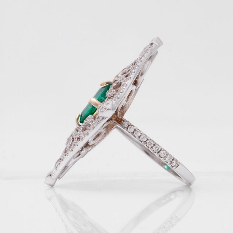 An octagonal/step-cut emerald, 1.65 cts, and diamond 1.25 cts (pavé-set) ring.