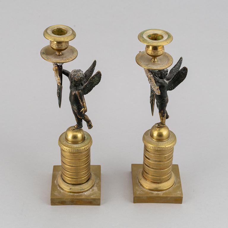 A pair of Empire candlesticks, first half of the 19th-century.