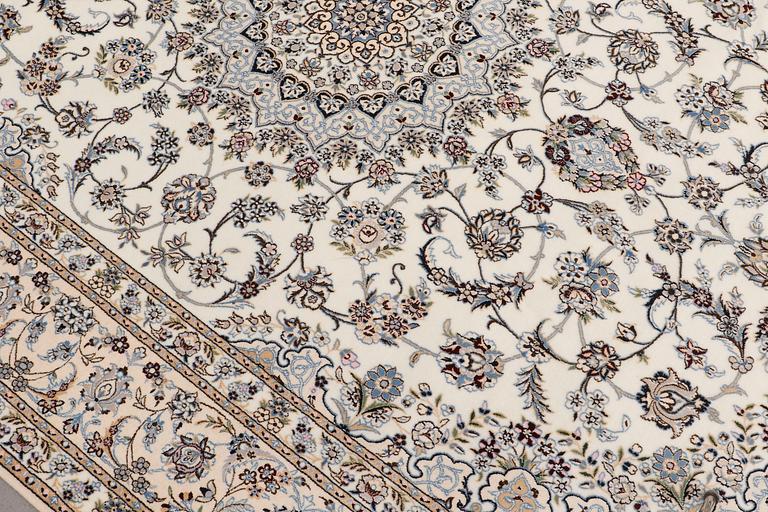 A part silk Nain carpet, c. 6LAA, ca. 310 x 209 cm.