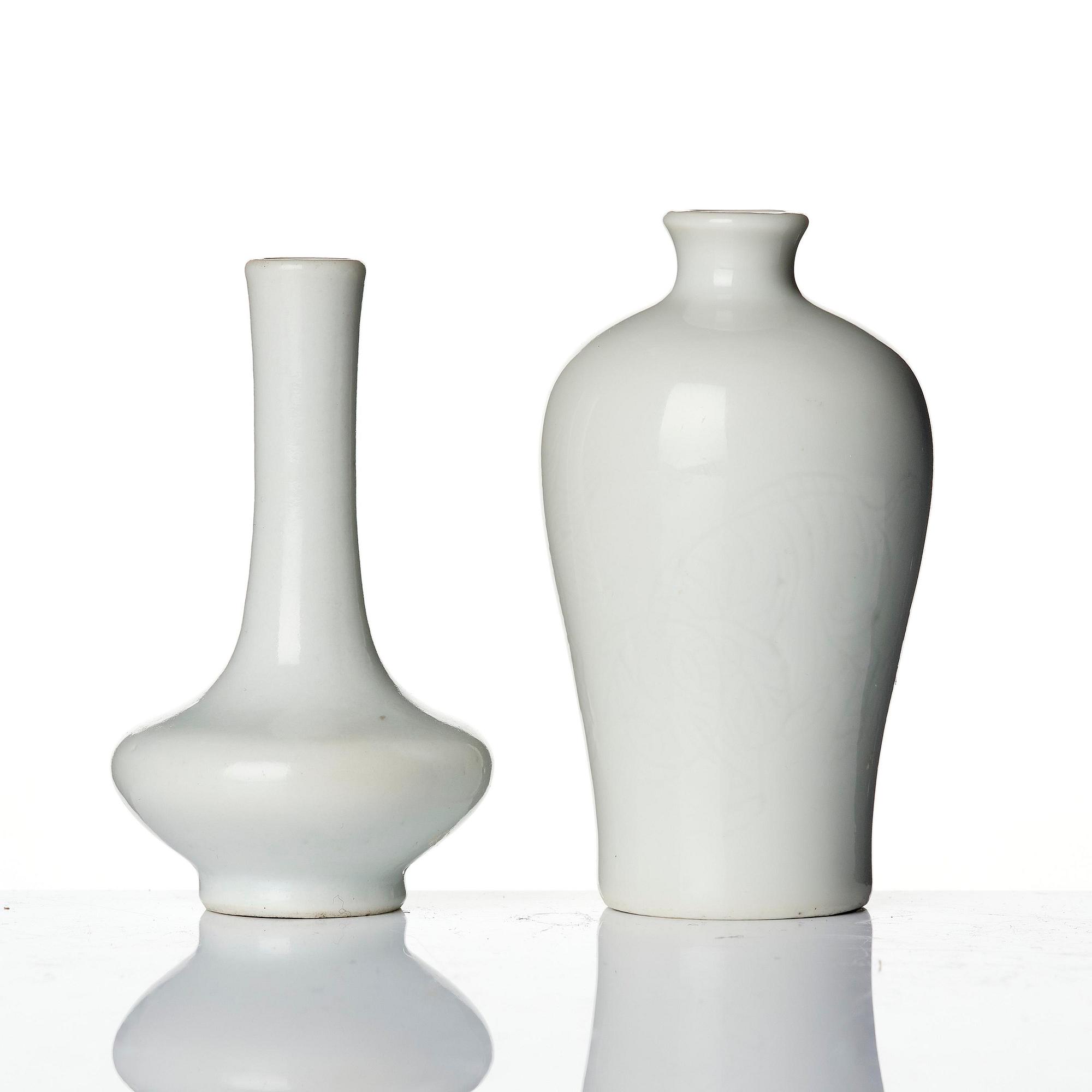 A pair of white glazed vases, Qing dynasty, 18th century.
