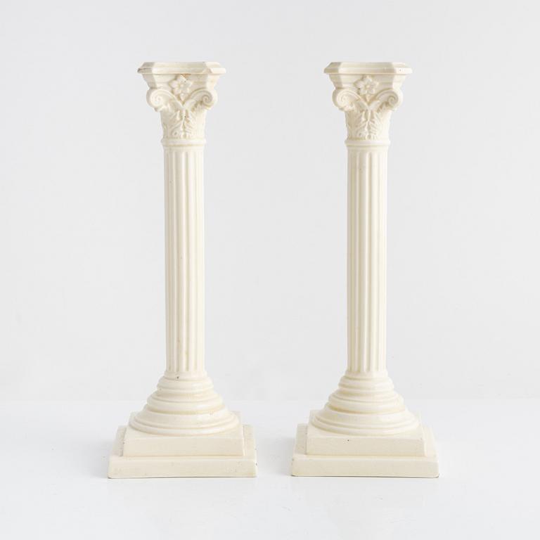 A pair of creamware candlesticks, around 1900.