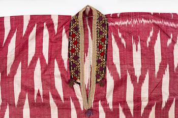 A silk and cotton Chapan, Ikat silk and cotton, Centralasien, 1880s.