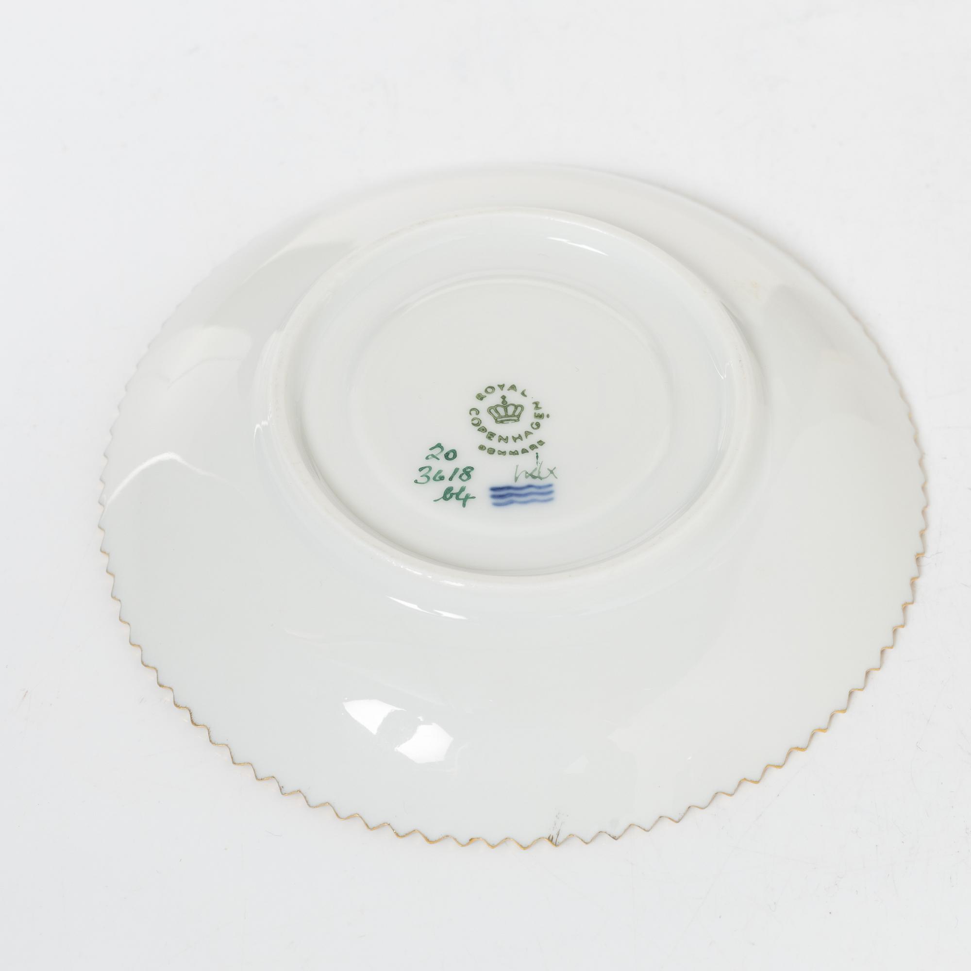 Royal Copenhagen, cream jug with lid and saucer, as well as coffee cup with saucer, porcelain, Flora Danica, Denmark.