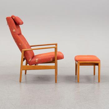 A 1950's/60's lounge chair and foot stool.