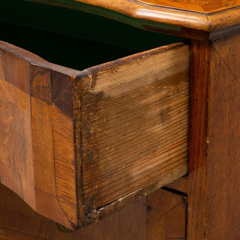 A late baroque chest of drawers, mid 18th century.