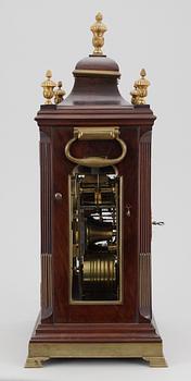 An Eardley Norton musical eight-bells and quarter chiming mahogany bracket clock playing four different tunes, verge escapment and engraved backplate.