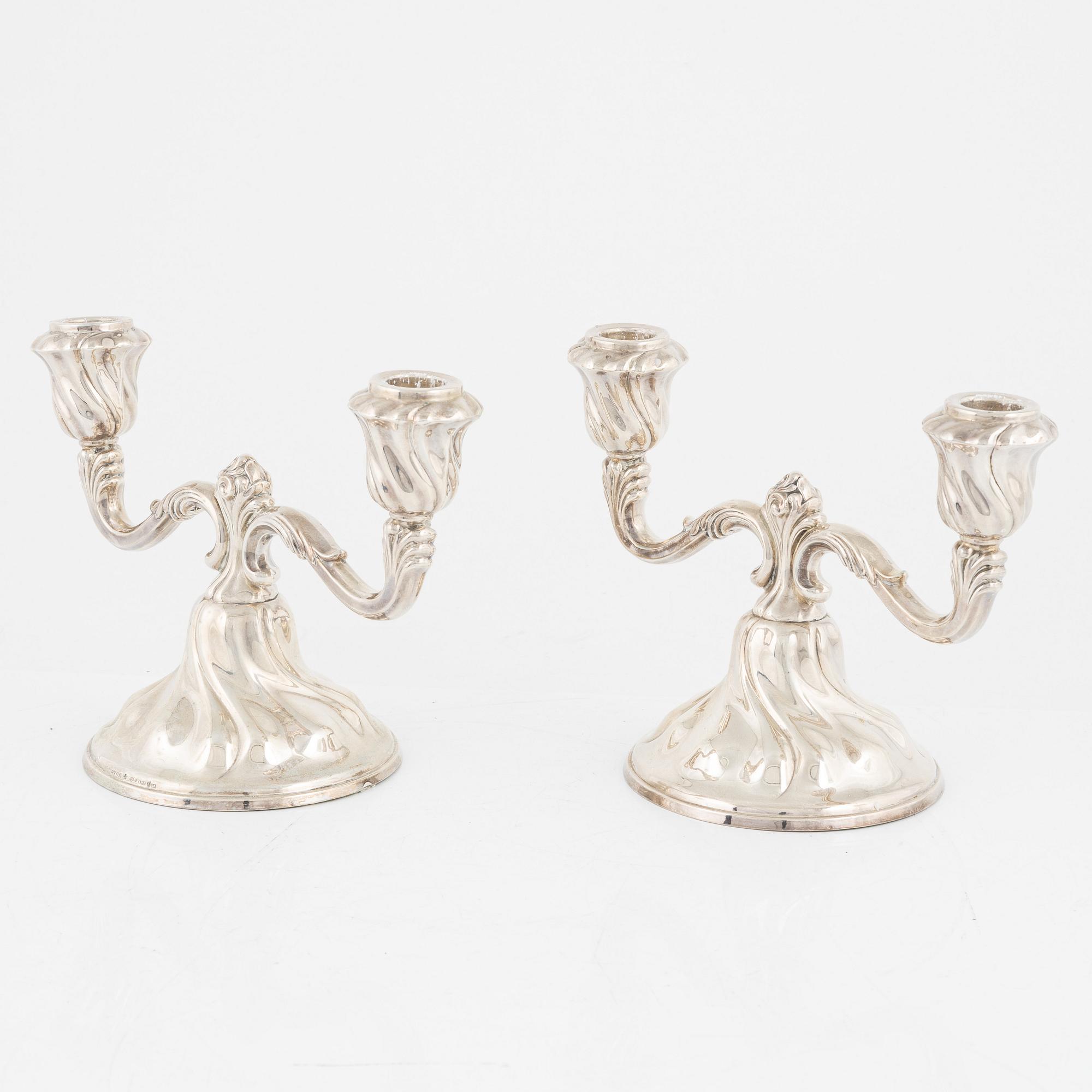 A pair of silver candelabras, first half of the 20th Century.