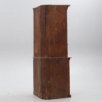 A Gustavian corner cabinet, circa 1800.