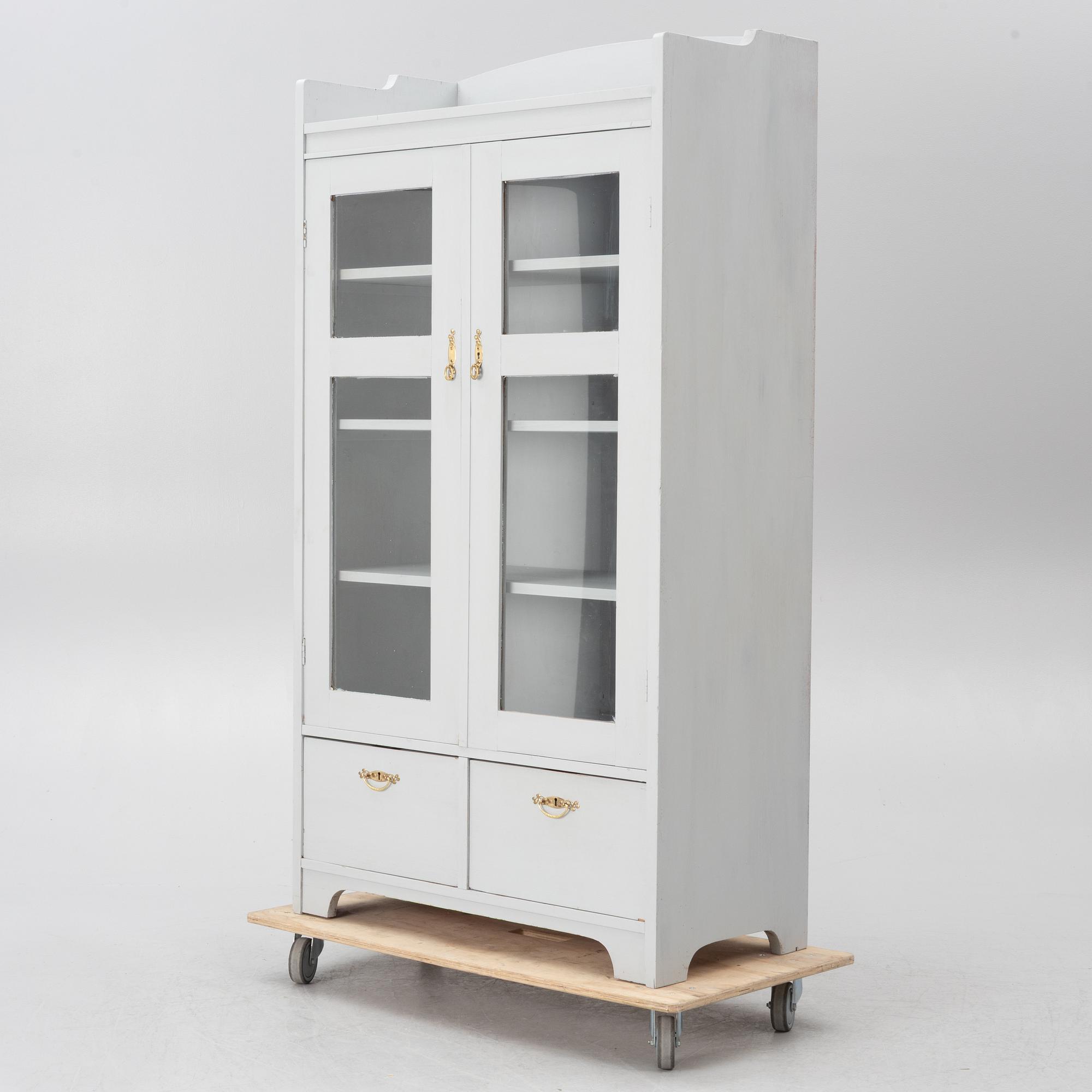 Display cabinet, early 20th century.