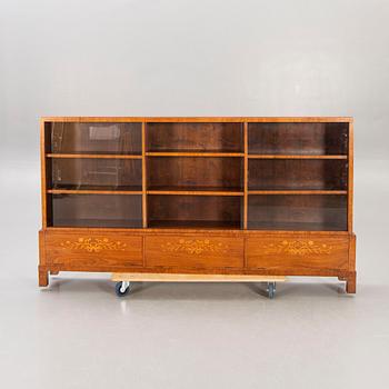 A Swedish Modern 1940s mahogany book cupboard.