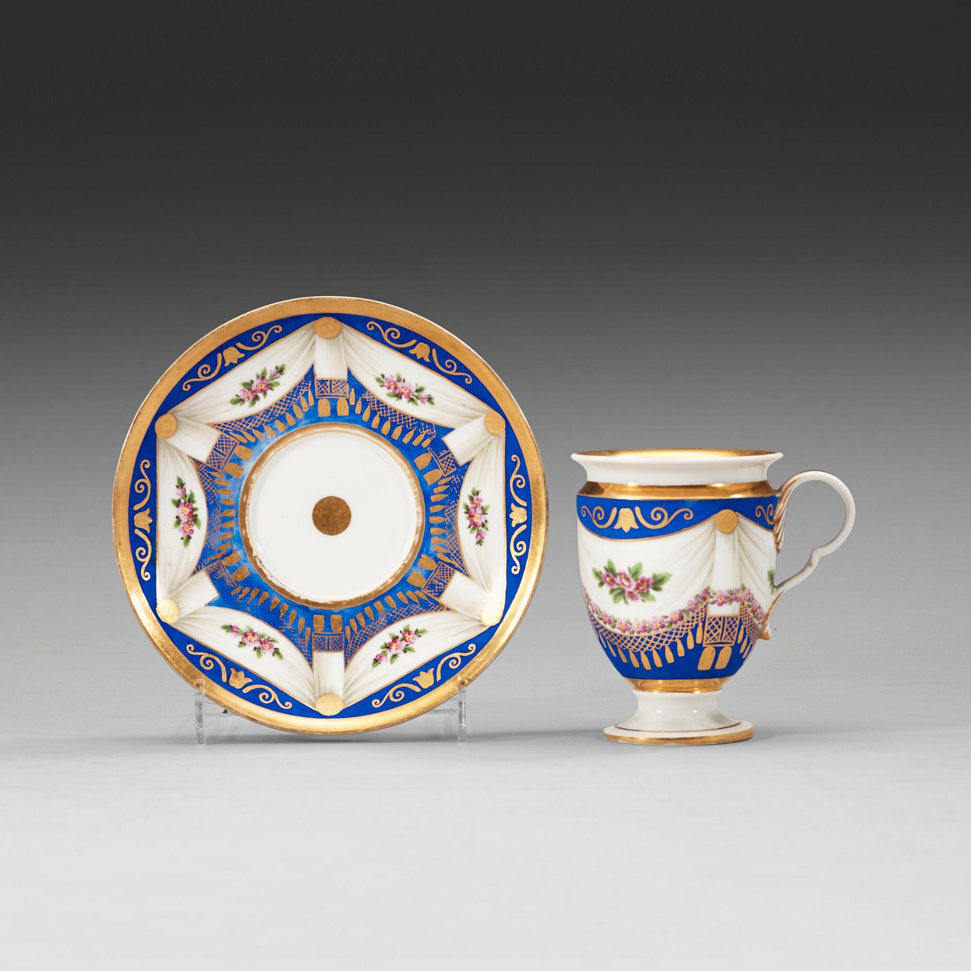 Meissen, A Meissen Empire cup with stand.